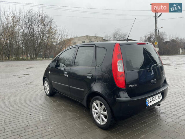Чорний Міцубісі Кольт, об'ємом двигуна 1.3 л та пробігом 184 тис. км за 5000 $, фото 8 на Automoto.ua