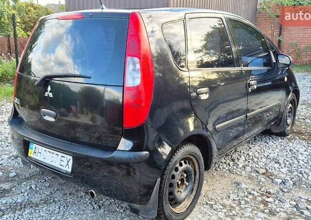 Чорний Міцубісі Кольт, об'ємом двигуна 1.3 л та пробігом 136 тис. км за 4500 $, фото 5 на Automoto.ua