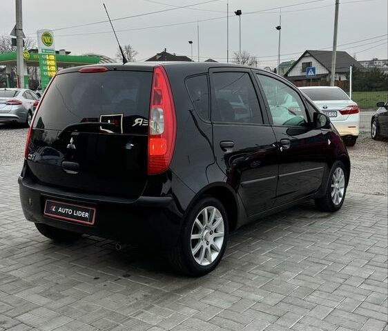 Черный Мицубиси Кольт, объемом двигателя 1.3 л и пробегом 154 тыс. км за 4700 $, фото 3 на Automoto.ua