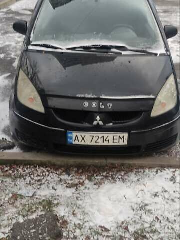 Черный Мицубиси Кольт, объемом двигателя 1.3 л и пробегом 202 тыс. км за 3900 $, фото 2 на Automoto.ua