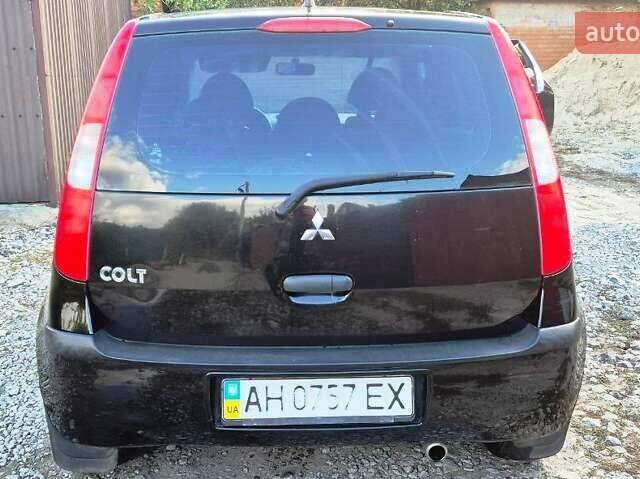 Чорний Міцубісі Кольт, об'ємом двигуна 1.3 л та пробігом 136 тис. км за 4500 $, фото 4 на Automoto.ua