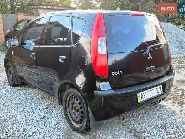 Чорний Міцубісі Кольт, об'ємом двигуна 1.3 л та пробігом 136 тис. км за 4500 $, фото 3 на Automoto.ua