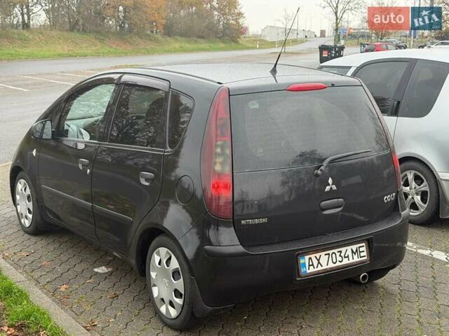Чорний Міцубісі Кольт, об'ємом двигуна 1.33 л та пробігом 198 тис. км за 3900 $, фото 8 на Automoto.ua
