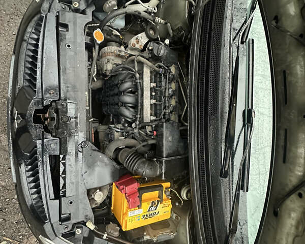 Чорний Міцубісі Кольт, об'ємом двигуна 1.32 л та пробігом 181 тис. км за 4400 $, фото 13 на Automoto.ua