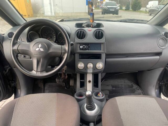 Черный Мицубиси Кольт, объемом двигателя 1.3 л и пробегом 213 тыс. км за 3700 $, фото 5 на Automoto.ua