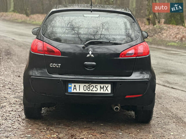 Чорний Міцубісі Кольт, об'ємом двигуна 1.32 л та пробігом 181 тис. км за 4400 $, фото 3 на Automoto.ua