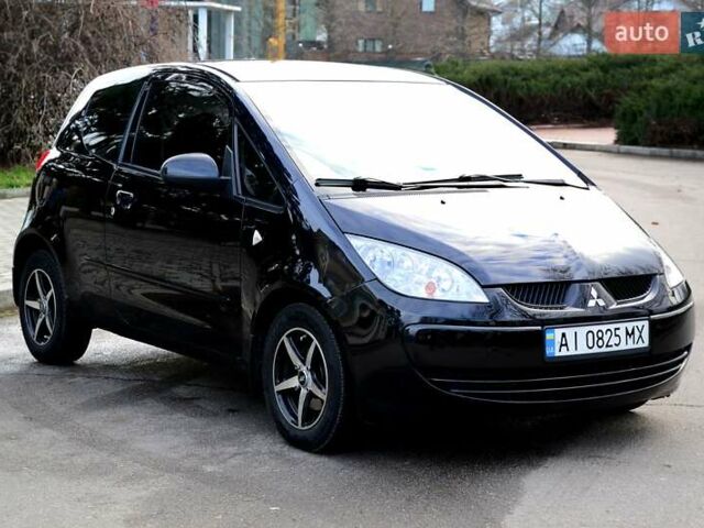 Чорний Міцубісі Кольт, об'ємом двигуна 1.32 л та пробігом 161 тис. км за 4500 $, фото 8 на Automoto.ua
