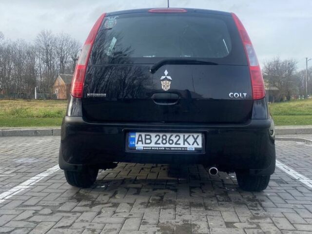 Черный Мицубиси Кольт, объемом двигателя 1.3 л и пробегом 213 тыс. км за 3700 $, фото 3 на Automoto.ua