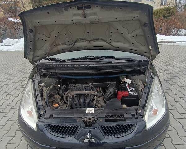 Чорний Міцубісі Кольт, об'ємом двигуна 1.33 л та пробігом 198 тис. км за 3900 $, фото 12 на Automoto.ua