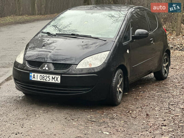 Чорний Міцубісі Кольт, об'ємом двигуна 1.32 л та пробігом 181 тис. км за 4400 $, фото 1 на Automoto.ua