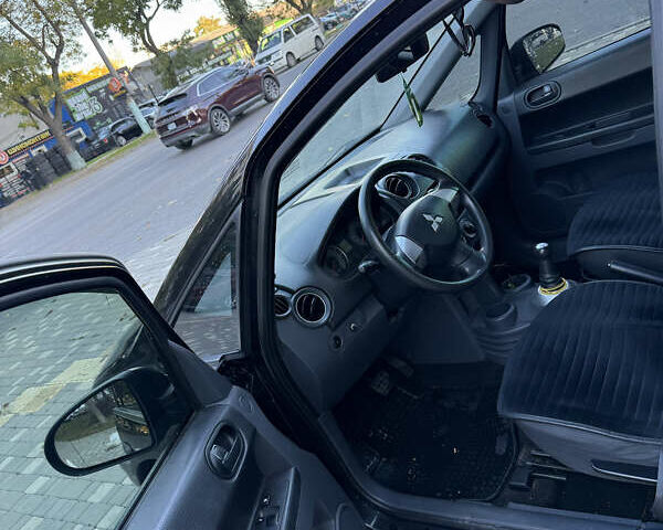 Чорний Міцубісі Кольт, об'ємом двигуна 1.33 л та пробігом 140 тис. км за 4999 $, фото 11 на Automoto.ua