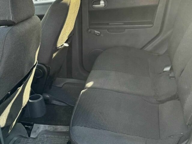 Чорний Міцубісі Кольт, об'ємом двигуна 1.3 л та пробігом 150 тис. км за 4400 $, фото 7 на Automoto.ua