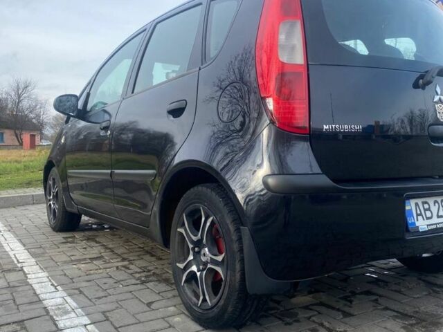 Черный Мицубиси Кольт, объемом двигателя 1.3 л и пробегом 213 тыс. км за 3700 $, фото 4 на Automoto.ua