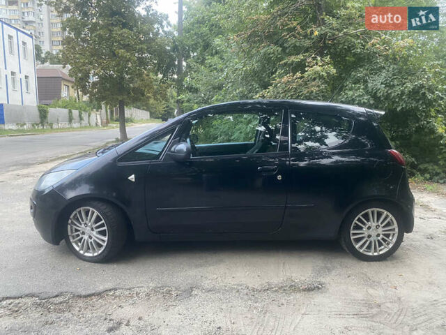 Чорний Міцубісі Кольт, об'ємом двигуна 1.3 л та пробігом 185 тис. км за 4300 $, фото 8 на Automoto.ua