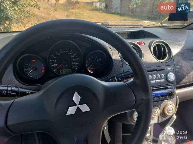 Чорний Міцубісі Кольт, об'ємом двигуна 1.33 л та пробігом 170 тис. км за 4550 $, фото 7 на Automoto.ua