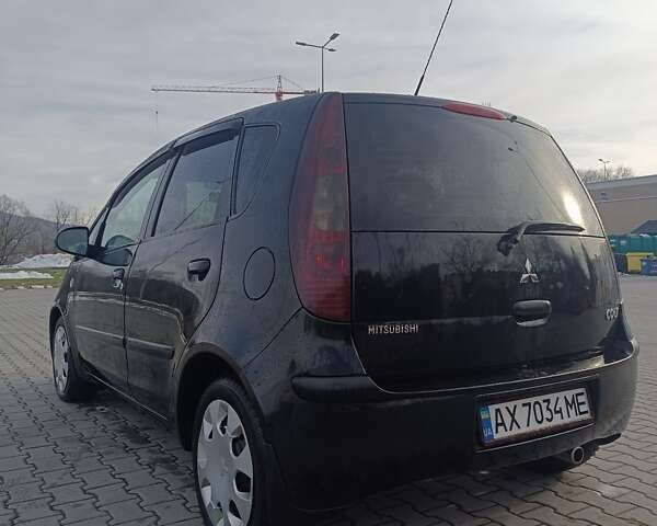 Чорний Міцубісі Кольт, об'ємом двигуна 1.33 л та пробігом 198 тис. км за 3900 $, фото 4 на Automoto.ua