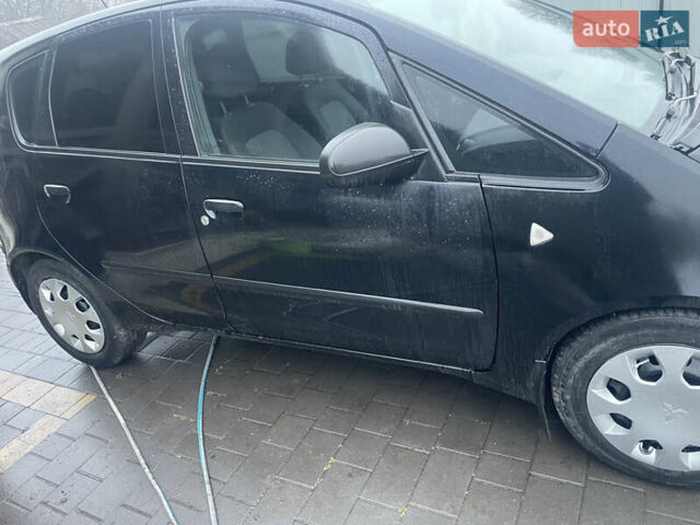 Черный Мицубиси Кольт, объемом двигателя 1.33 л и пробегом 217 тыс. км за 3900 $, фото 4 на Automoto.ua