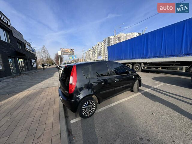 Черный Мицубиси Кольт, объемом двигателя 1.33 л и пробегом 250 тыс. км за 4500 $, фото 1 на Automoto.ua