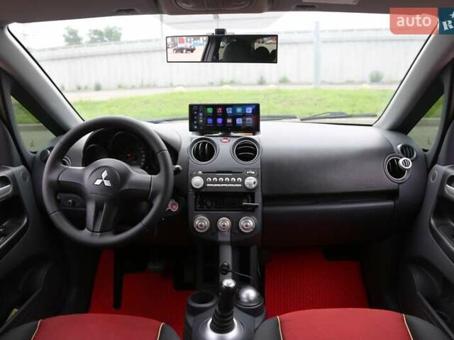 Черный Мицубиси Кольт, объемом двигателя 1.33 л и пробегом 201 тыс. км за 4300 $, фото 12 на Automoto.ua