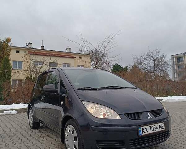 Чорний Міцубісі Кольт, об'ємом двигуна 1.33 л та пробігом 198 тис. км за 3900 $, фото 1 на Automoto.ua