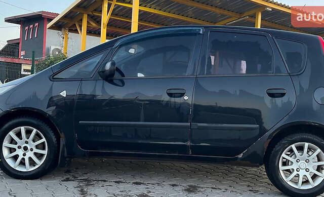 Міцубісі Кольт 2008 у Хмельницькому на Automoto.ua Чорний Міцубісі Кольт, об'ємом двигуна 1.3 л та пробігом 267 тис. км за 4000 $, фото 4 на Automoto.ua