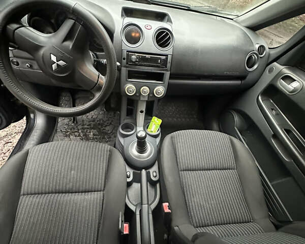 Чорний Міцубісі Кольт, об'ємом двигуна 1.32 л та пробігом 181 тис. км за 4400 $, фото 10 на Automoto.ua