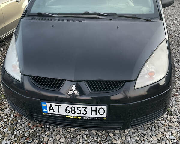 Черный Мицубиси Кольт, объемом двигателя 1.33 л и пробегом 217 тыс. км за 3900 $, фото 1 на Automoto.ua