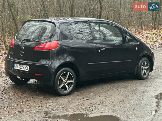 Чорний Міцубісі Кольт, об'ємом двигуна 1.32 л та пробігом 181 тис. км за 4400 $, фото 2 на Automoto.ua