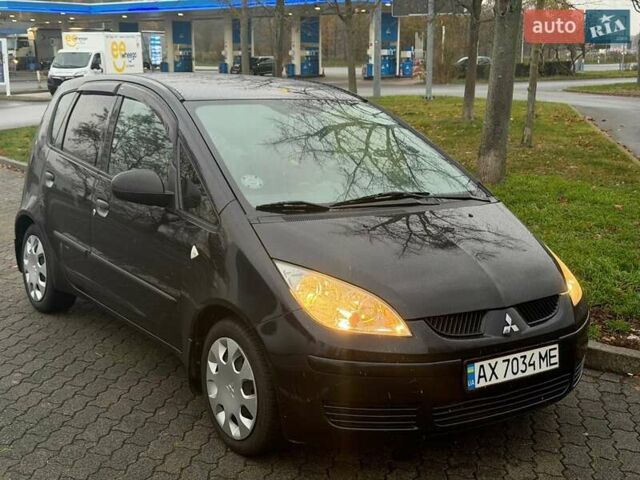 Чорний Міцубісі Кольт, об'ємом двигуна 1.33 л та пробігом 198 тис. км за 3900 $, фото 13 на Automoto.ua