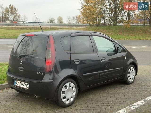 Чорний Міцубісі Кольт, об'ємом двигуна 1.33 л та пробігом 198 тис. км за 3900 $, фото 15 на Automoto.ua