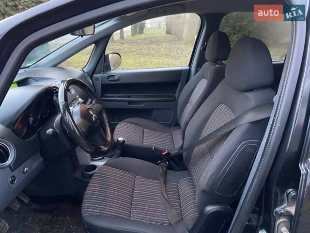 Черный Мицубиси Кольт, объемом двигателя 1.33 л и пробегом 133 тыс. км за 4000 $, фото 7 на Automoto.ua