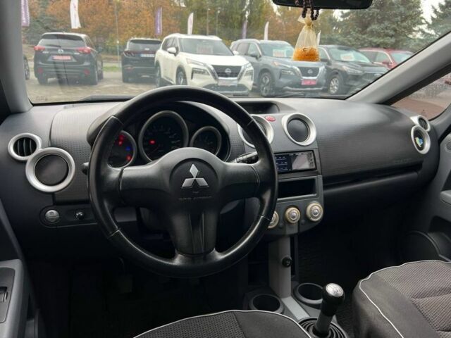 Міцубісі Кольт 2008 у Кривому Розі на Automoto.ua Чорний Міцубісі Кольт, об'ємом двигуна 1.3 л та пробігом 235 тис. км за 4400 $, фото 17 на Automoto.ua