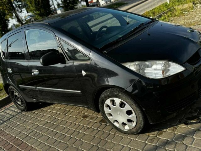 Чорний Міцубісі Кольт, об'ємом двигуна 1.3 л та пробігом 150 тис. км за 4400 $, фото 5 на Automoto.ua