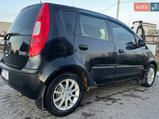 Міцубісі Кольт 2008 у Хмельницькому на Automoto.ua Чорний Міцубісі Кольт, об'ємом двигуна 1.3 л та пробігом 267 тис. км за 4000 $, фото 9 на Automoto.ua
