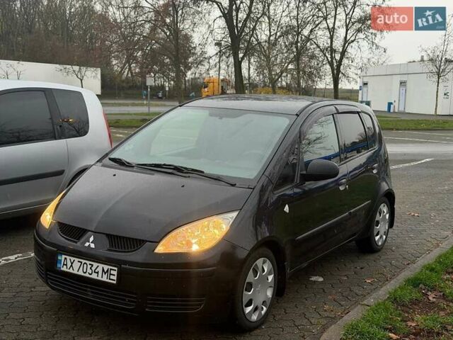 Чорний Міцубісі Кольт, об'ємом двигуна 1.33 л та пробігом 198 тис. км за 3900 $, фото 14 на Automoto.ua