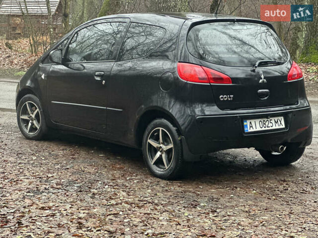 Чорний Міцубісі Кольт, об'ємом двигуна 1.32 л та пробігом 181 тис. км за 4400 $, фото 4 на Automoto.ua