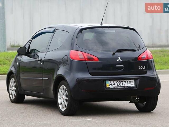 Черный Мицубиси Кольт, объемом двигателя 1.33 л и пробегом 201 тыс. км за 4300 $, фото 4 на Automoto.ua
