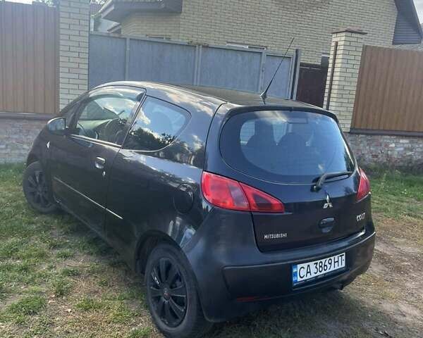 Черный Мицубиси Кольт, объемом двигателя 1.3 л и пробегом 195 тыс. км за 3500 $, фото 5 на Automoto.ua