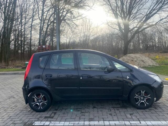 Черный Мицубиси Кольт, объемом двигателя 1.3 л и пробегом 213 тыс. км за 3700 $, фото 1 на Automoto.ua