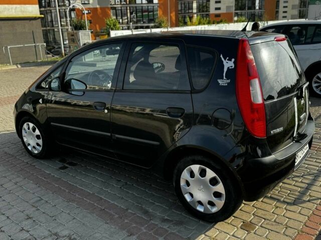 Чорний Міцубісі Кольт, об'ємом двигуна 1.3 л та пробігом 150 тис. км за 4400 $, фото 1 на Automoto.ua