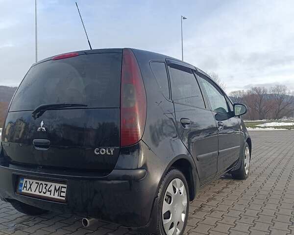 Чорний Міцубісі Кольт, об'ємом двигуна 1.33 л та пробігом 198 тис. км за 3900 $, фото 3 на Automoto.ua