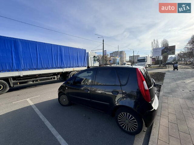 Черный Мицубиси Кольт, объемом двигателя 1.33 л и пробегом 250 тыс. км за 4500 $, фото 2 на Automoto.ua