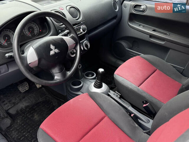 Чорний Міцубісі Кольт, об'ємом двигуна 1.33 л та пробігом 149 тис. км за 4850 $, фото 9 на Automoto.ua