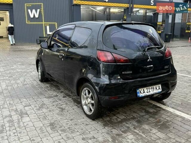 Чорний Міцубісі Кольт, об'ємом двигуна 1.3 л та пробігом 110 тис. км за 5900 $, фото 2 на Automoto.ua