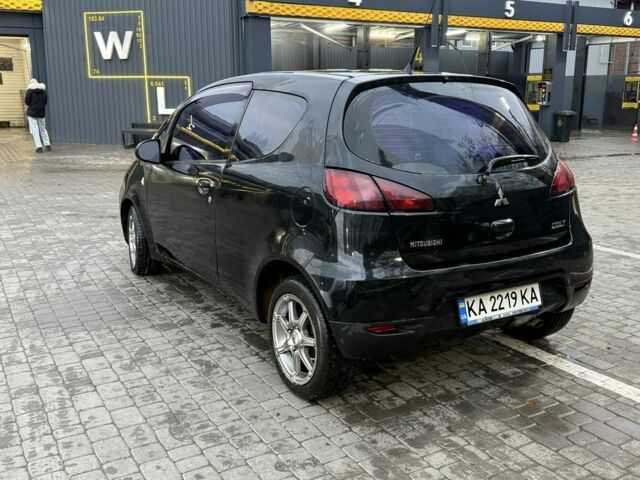 Черный Мицубиси Кольт, объемом двигателя 1.3 л и пробегом 110 тыс. км за 5900 $, фото 3 на Automoto.ua