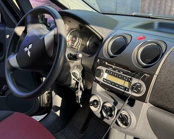 Чорний Міцубісі Кольт, об'ємом двигуна 1.3 л та пробігом 110 тис. км за 5900 $, фото 5 на Automoto.ua