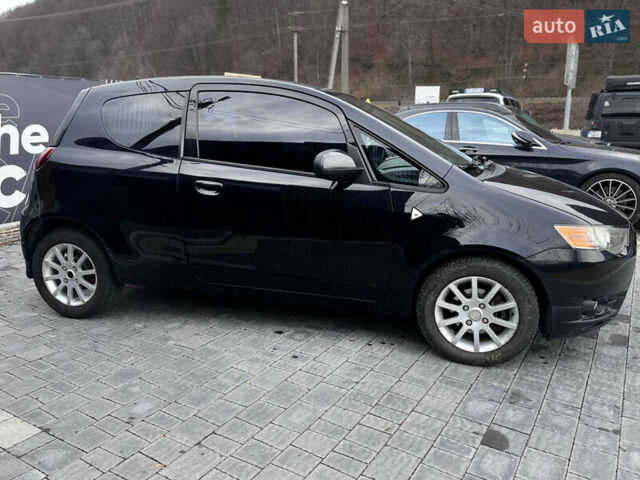 Чорний Міцубісі Кольт, об'ємом двигуна 1.33 л та пробігом 149 тис. км за 4850 $, фото 4 на Automoto.ua