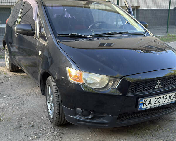 Черный Мицубиси Кольт, объемом двигателя 1.33 л и пробегом 130 тыс. км за 5700 $, фото 1 на Automoto.ua