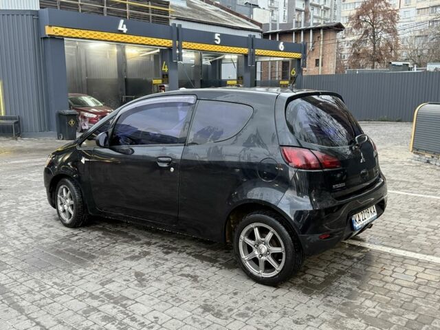 Черный Мицубиси Кольт, объемом двигателя 1.3 л и пробегом 110 тыс. км за 5900 $, фото 1 на Automoto.ua