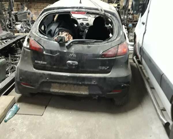 Чорний Міцубісі Кольт, об'ємом двигуна 1.3 л та пробігом 122 тис. км за 1600 $, фото 1 на Automoto.ua